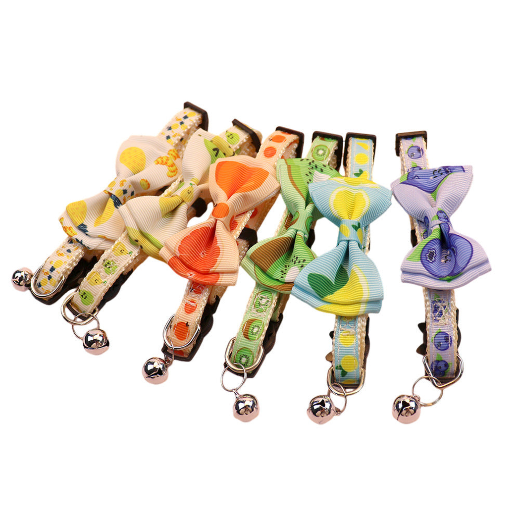 Six fruit-print cat collars with matching bows and silver-tone bells