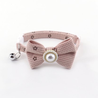 Light pink floral bow cat collar with bell and pearl-look center
