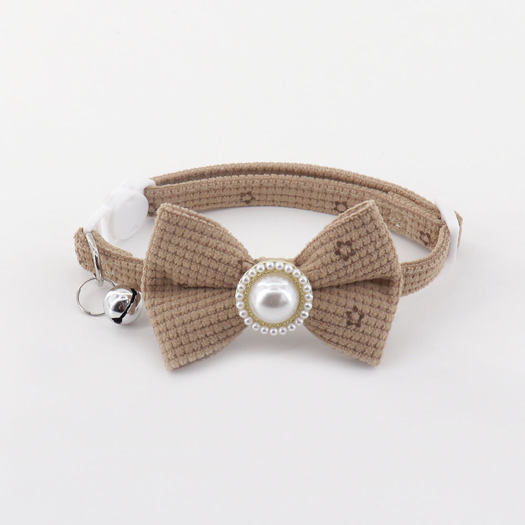 Beige floral bow cat collar with bell and pearl-look center