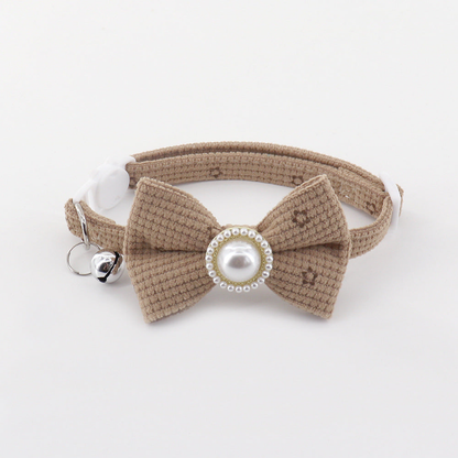 Beige floral bow cat collar with bell and pearl-look center