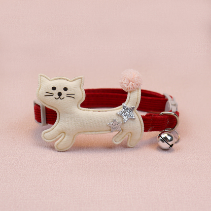 Red cat collar with ivory cat applique, pom-pom tail and bell
