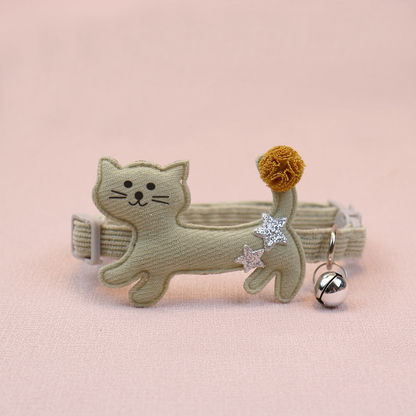 Muted green cat collar with cat applique, pom-pom tail and bell
