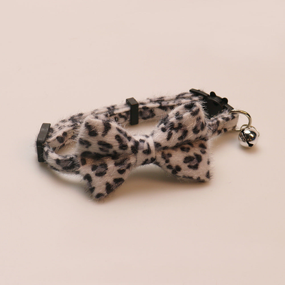 Light gray leopard-print cat collar with bow and bell