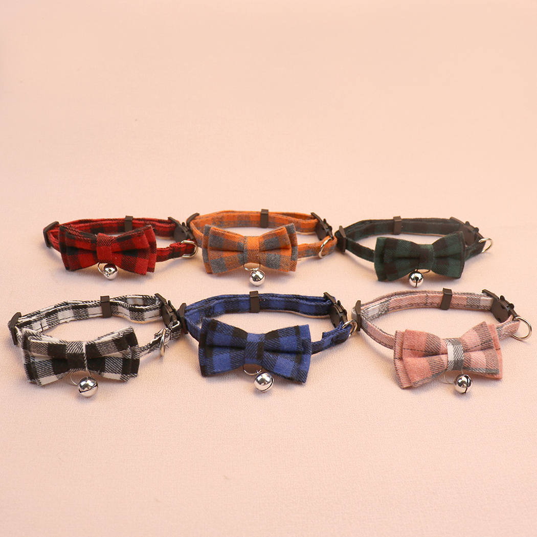 Six plaid bow cat collars with bells arranged in two rows