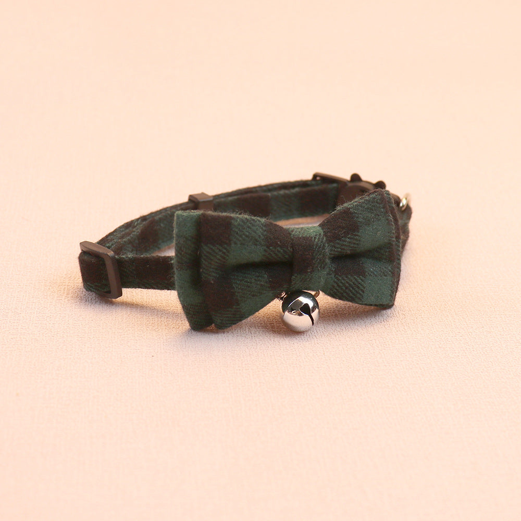 Dark green and black plaid bow cat collar with centered bell