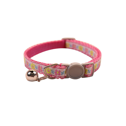 Pink floral cat collar with bell and round buckle on a white background