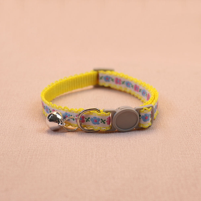 Yellow floral cat collar with bell and round buckle