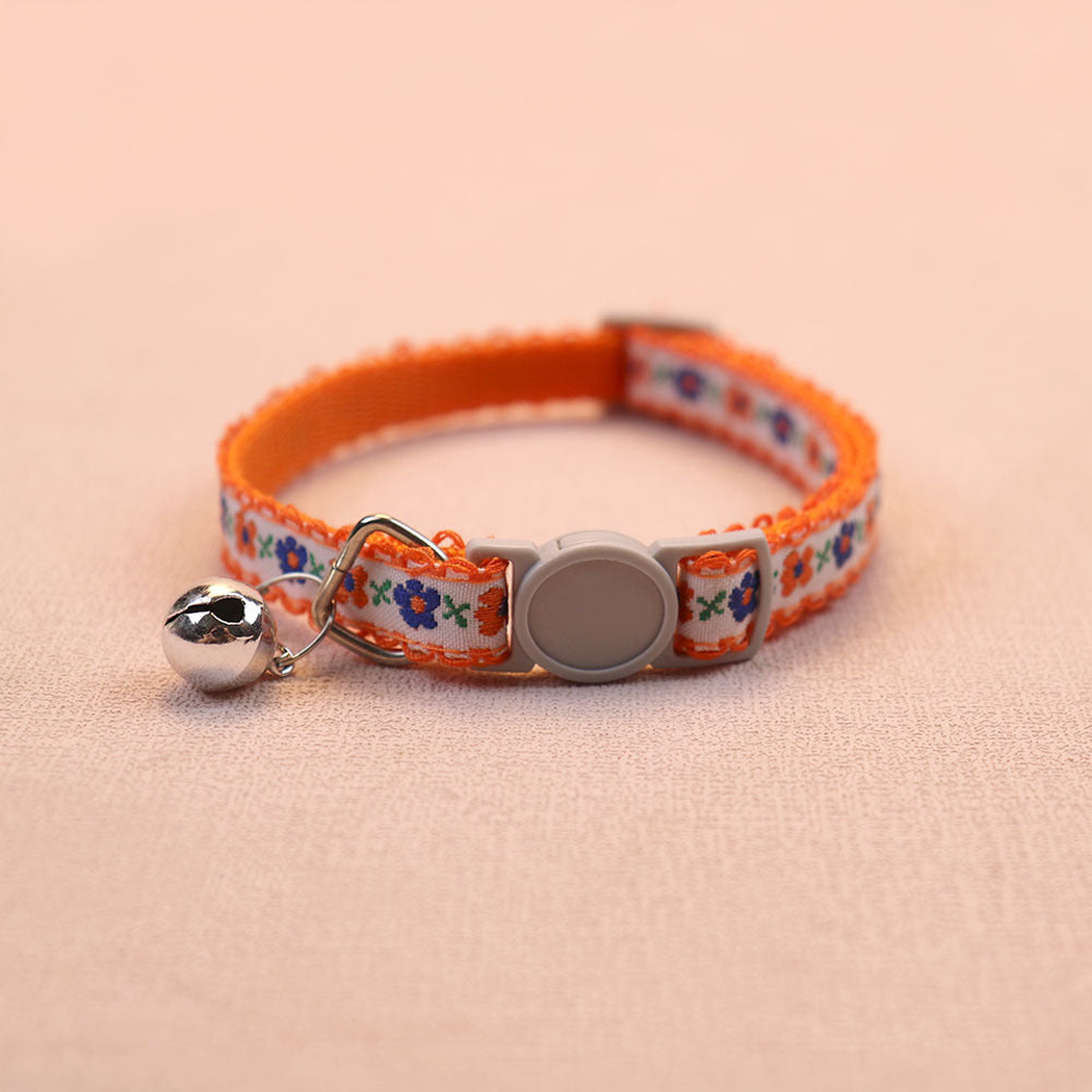 Orange floral cat collar with bell and round buckle