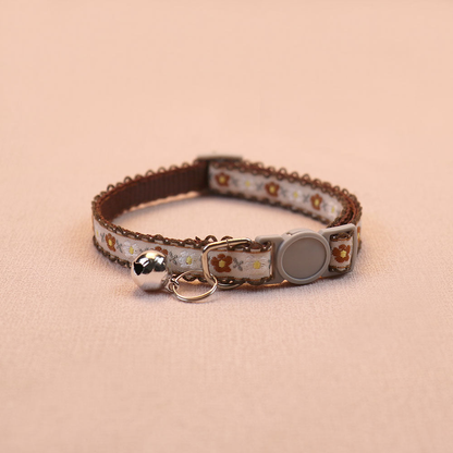 Brown floral cat collar with bell and round buckle