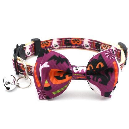 Purple cat collar with pumpkin, ghost and candy-print bow and bell