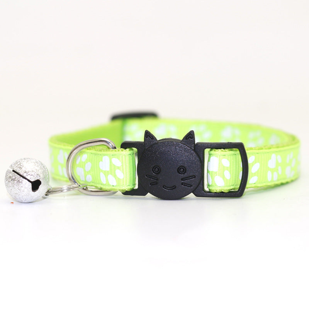 Fluorescent green paw-print cat collar with cat-face buckle and bell