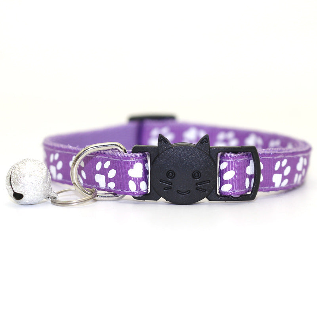 Purple paw-print cat collar with cat-face buckle and bell