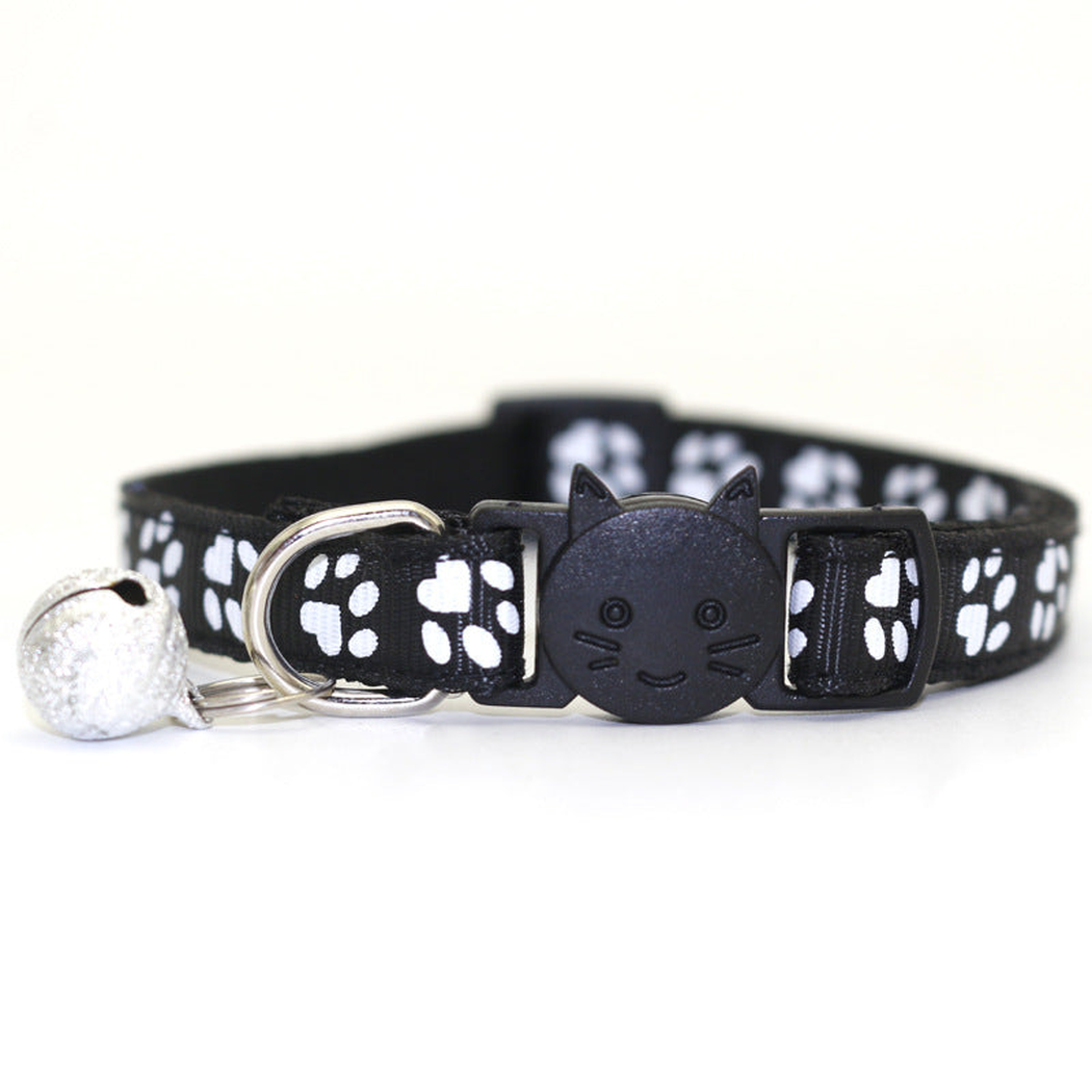 Black paw-print cat collar with cat-face buckle and bell