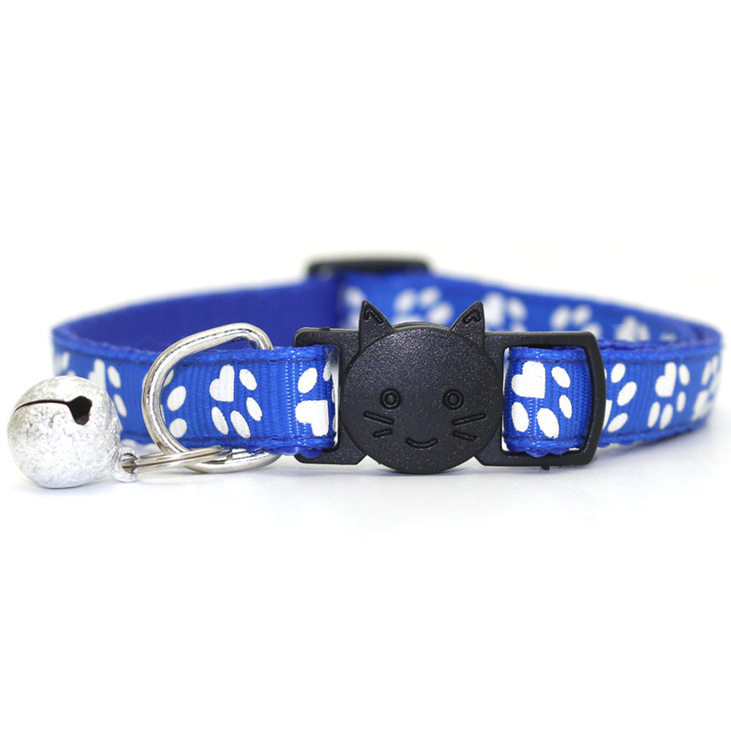 Royal blue paw-print cat collar with cat-face buckle and bell