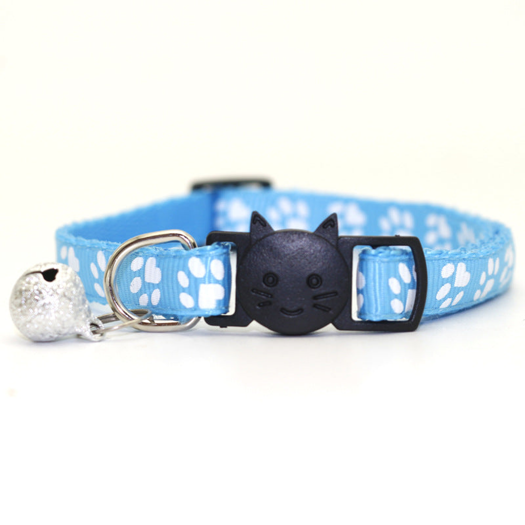 Sky blue paw-print cat collar with cat-face buckle and bell