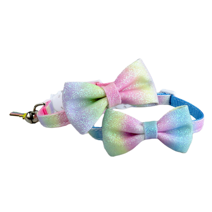 Pink and blue gradient glitter bow cat collars displayed together