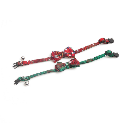 Red and green plaid bow cat collars laid flat with adjustable straps