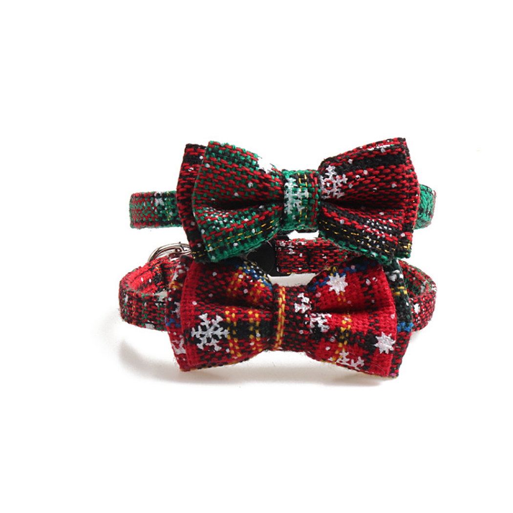 Red and green plaid bow cat collars stacked together