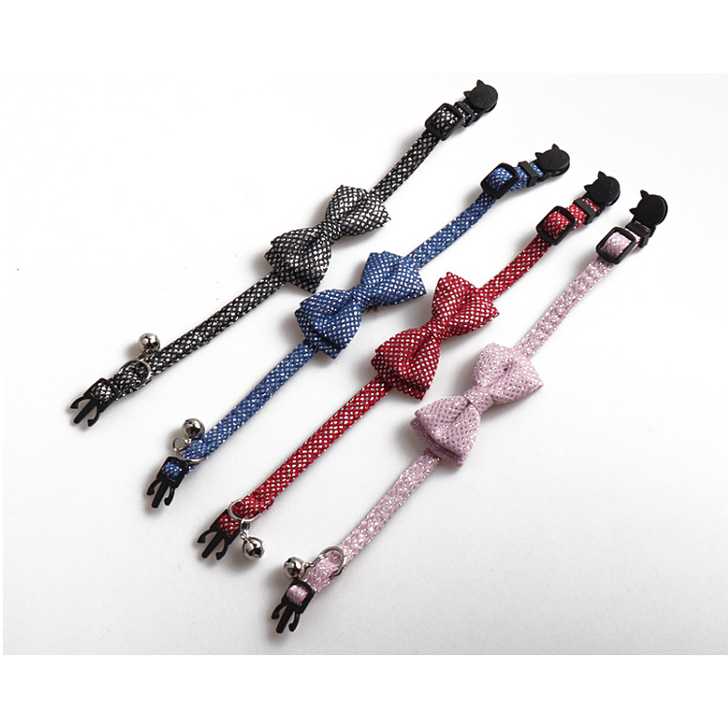 Four silver-dot bow cat collars displayed in black, blue, red and light pink