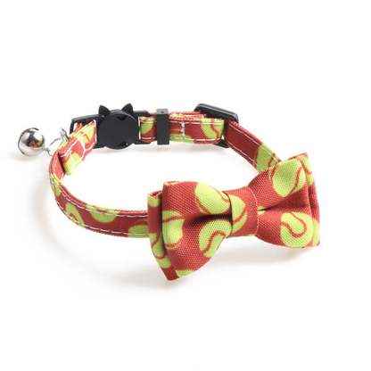 Red tennis ball print cat collar with bow and bell