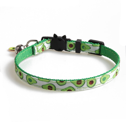 Green and white avocado-pattern cat collar with cat-face buckle, bell and avocado charm