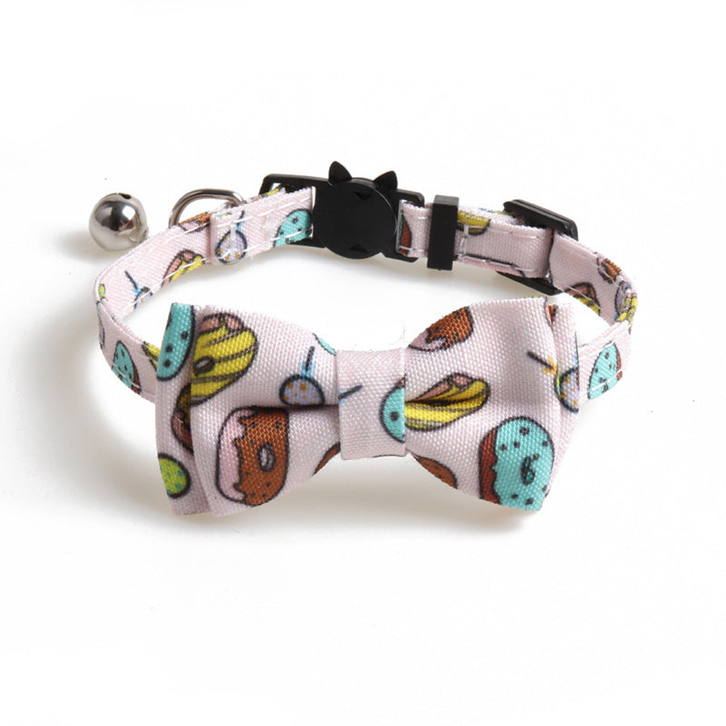 Pink dessert-print cat collar with matching bow and bell