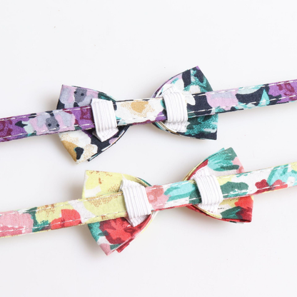 Close-up of the stitched floral straps and bow attachment loops