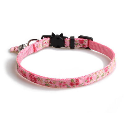 Pink floral cat collar with black cat-face buckle