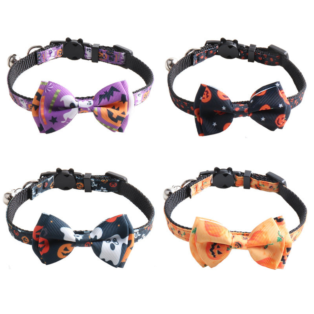Four pumpkin-print bow cat collars displayed together