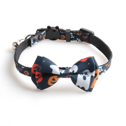 Black bow cat collar with large pumpkins, ghosts and bones
