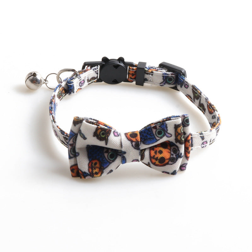 White owl-and-pumpkin-print bow cat collar with bell