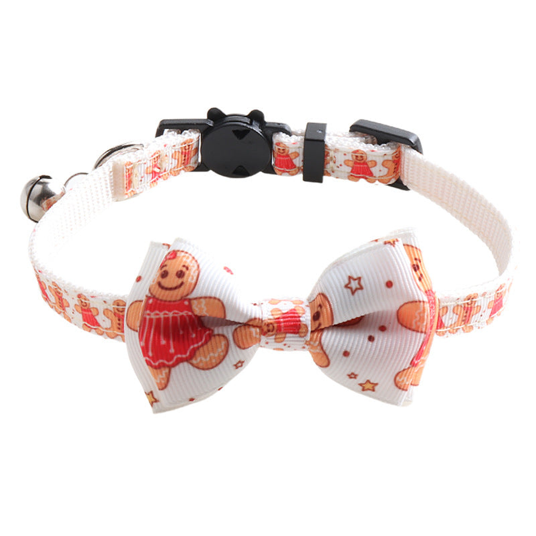 White gingerbread-pattern bow cat collar with bell and cat-face clasp