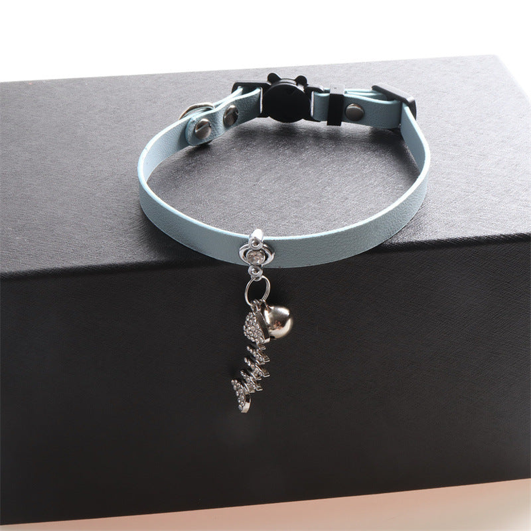 Light blue cat collar with bell and dangling fishbone charm