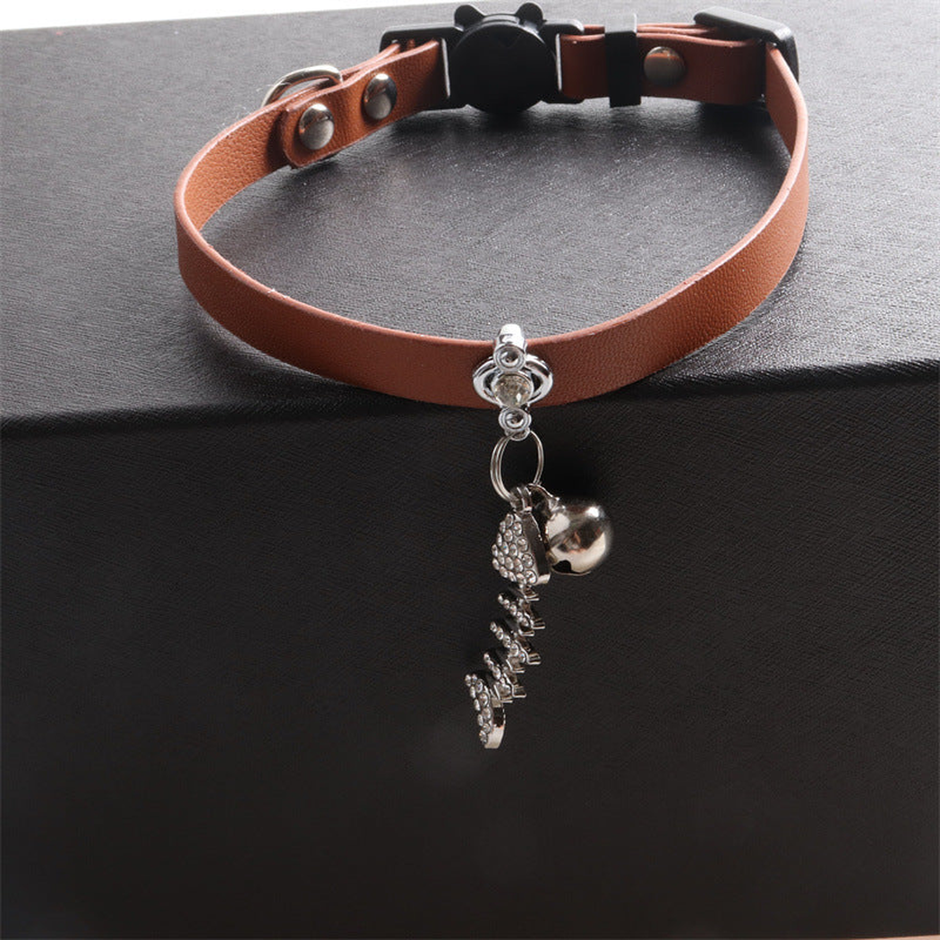 Brown cat collar with bell and dangling fishbone charm