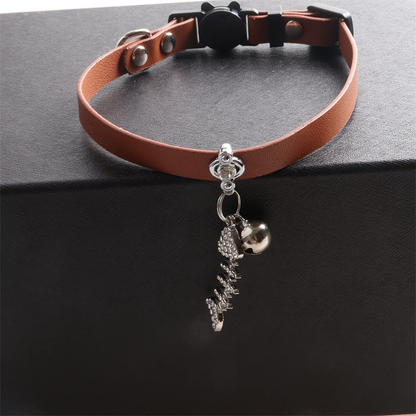 Brown cat collar with bell and dangling fishbone charm