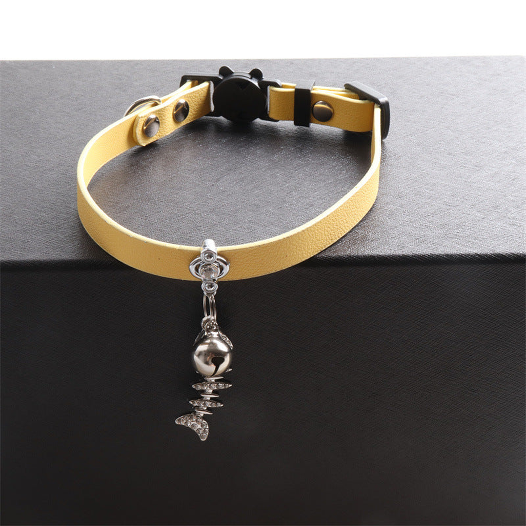 Yellow cat collar with bell and dangling fishbone charm