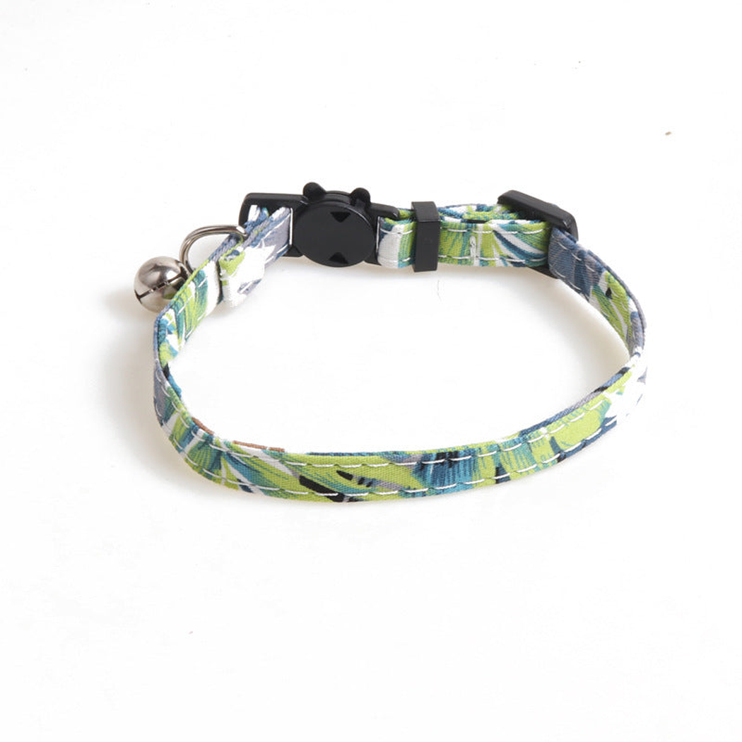 Green leaf-print cat collar without a bow, with bell and cat-face buckle