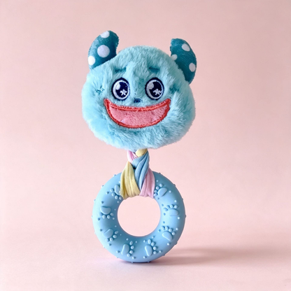 Light blue smiling monster-face ring dog toy, front view