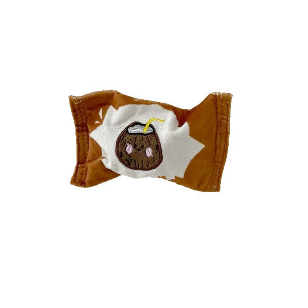 Brown candy-shaped dog toy with coconut drink face patch, front view