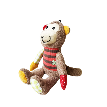 Monkey character dog toy with striped body and contrasting patchwork limbs