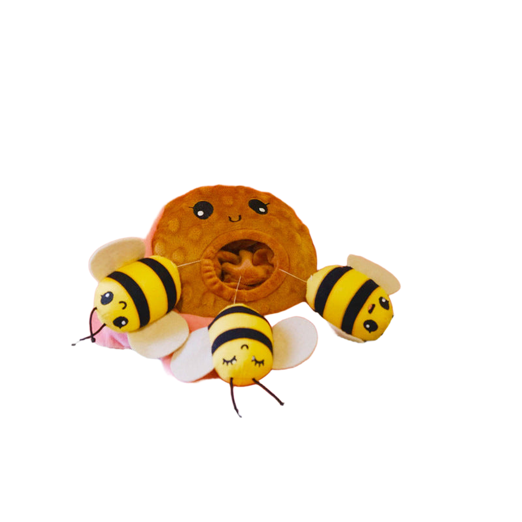 Pink flower dog toy with three bee pieces, front view