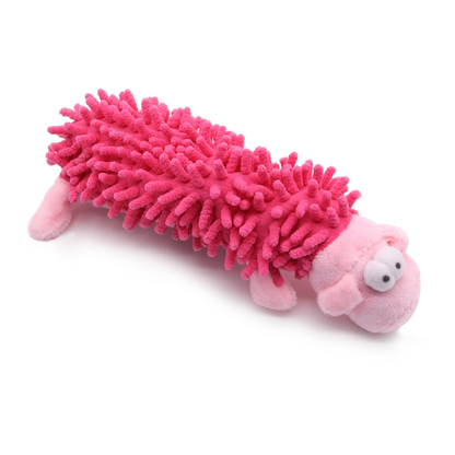 Pink pig-character dog toy with a fuchsia tufted body