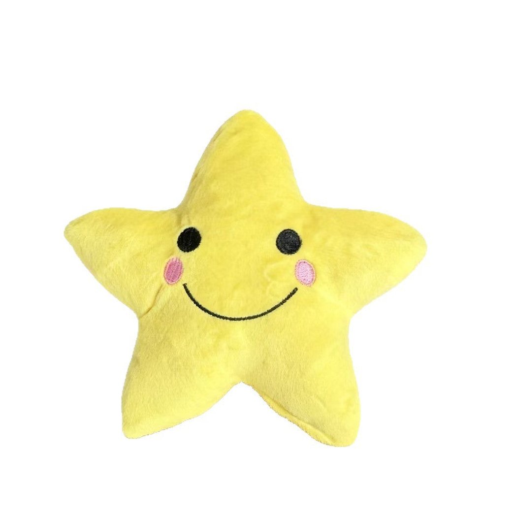 Yellow star-shaped dog toy with stitched smiling face, front view