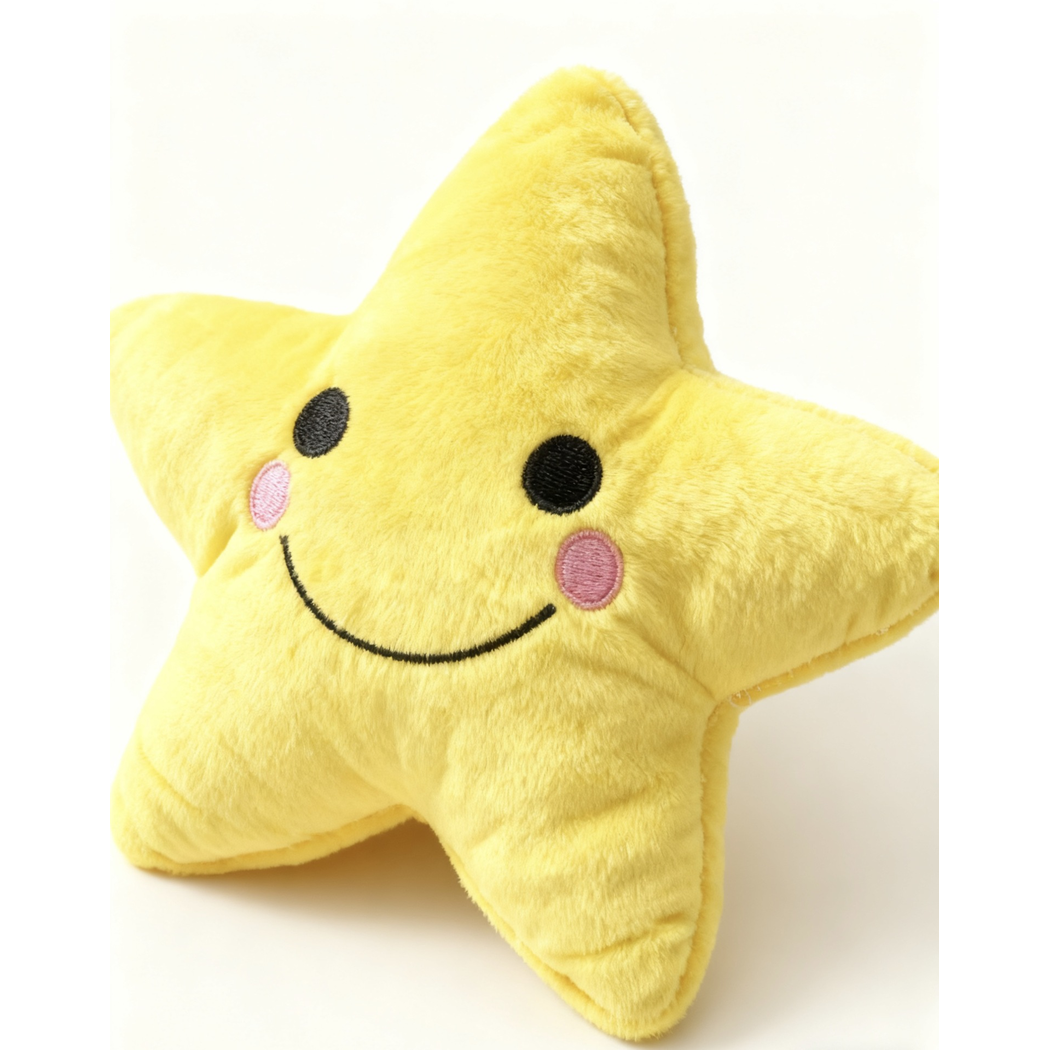 Close-up of yellow star dog toy with stitched smile and short fuzzy surface