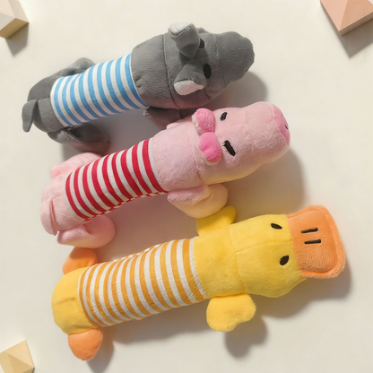 Pink, gray and yellow striped character dog toys arranged together