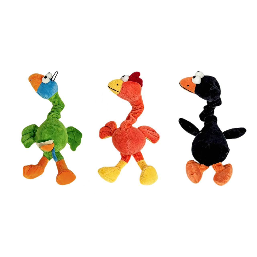 Green, orange and black bird-shaped plush dog toys displayed together