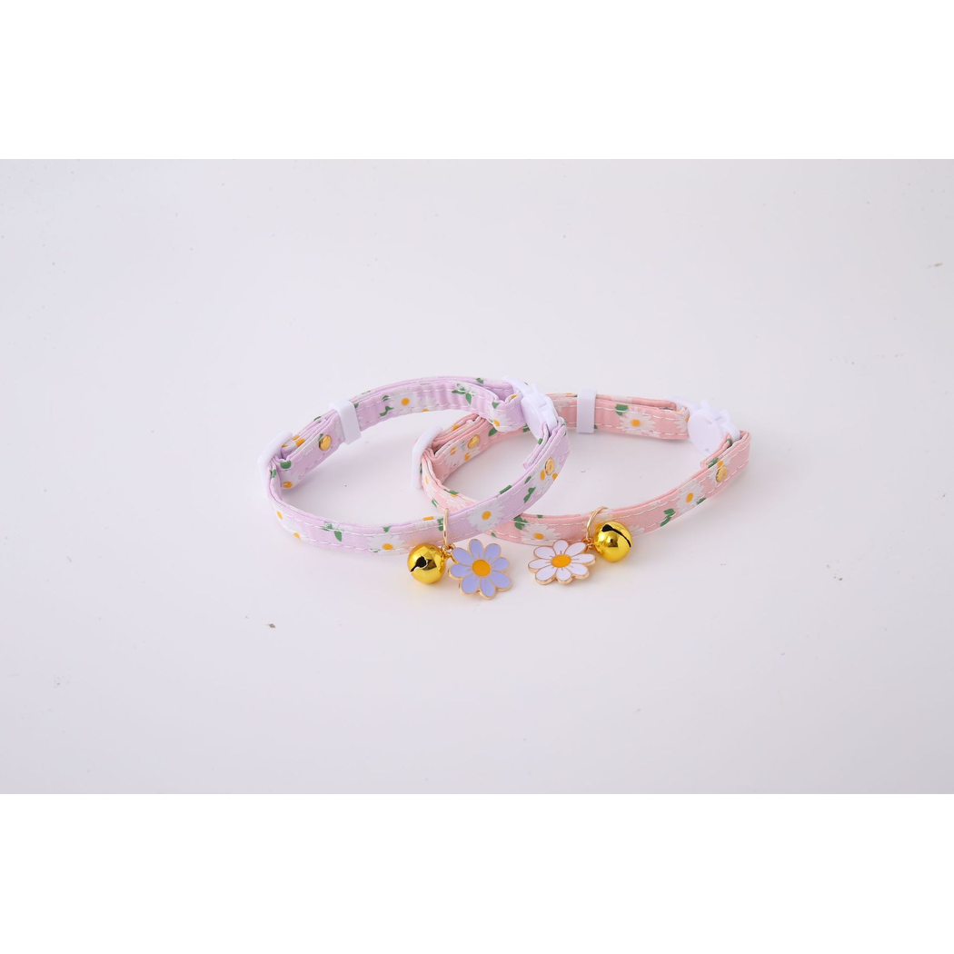 Pink and light purple daisy-print cat collars displayed together