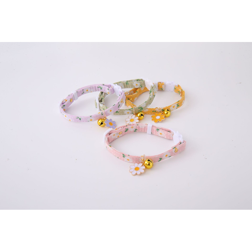Four daisy-print cat collar colors arranged together with flower charms and bells