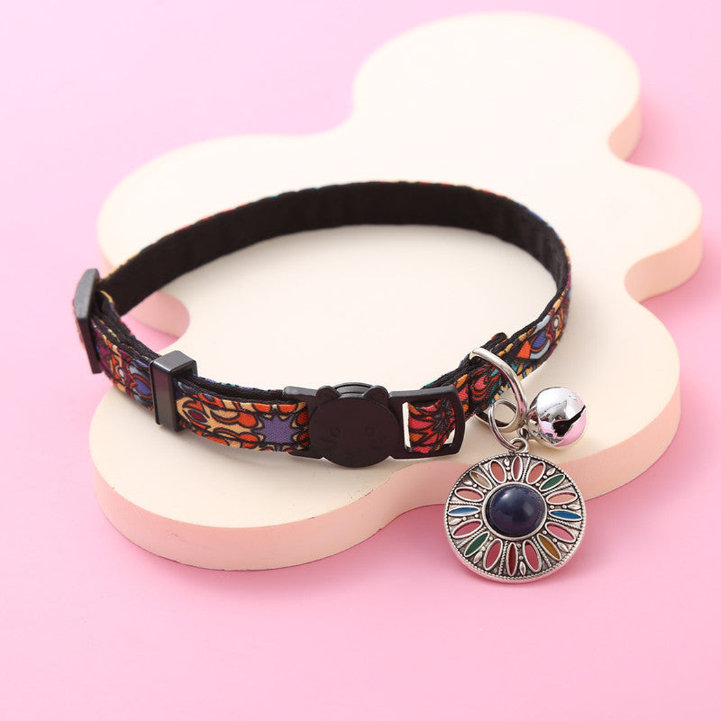 Navy Sunburst multicolor cat collar with silver-tone bell and hanging medallion