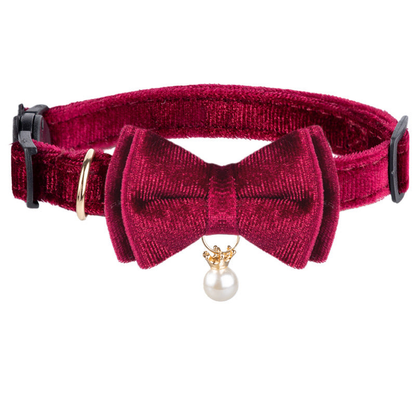 Burgundy Bowtie cat collar with white bead charm on a white background